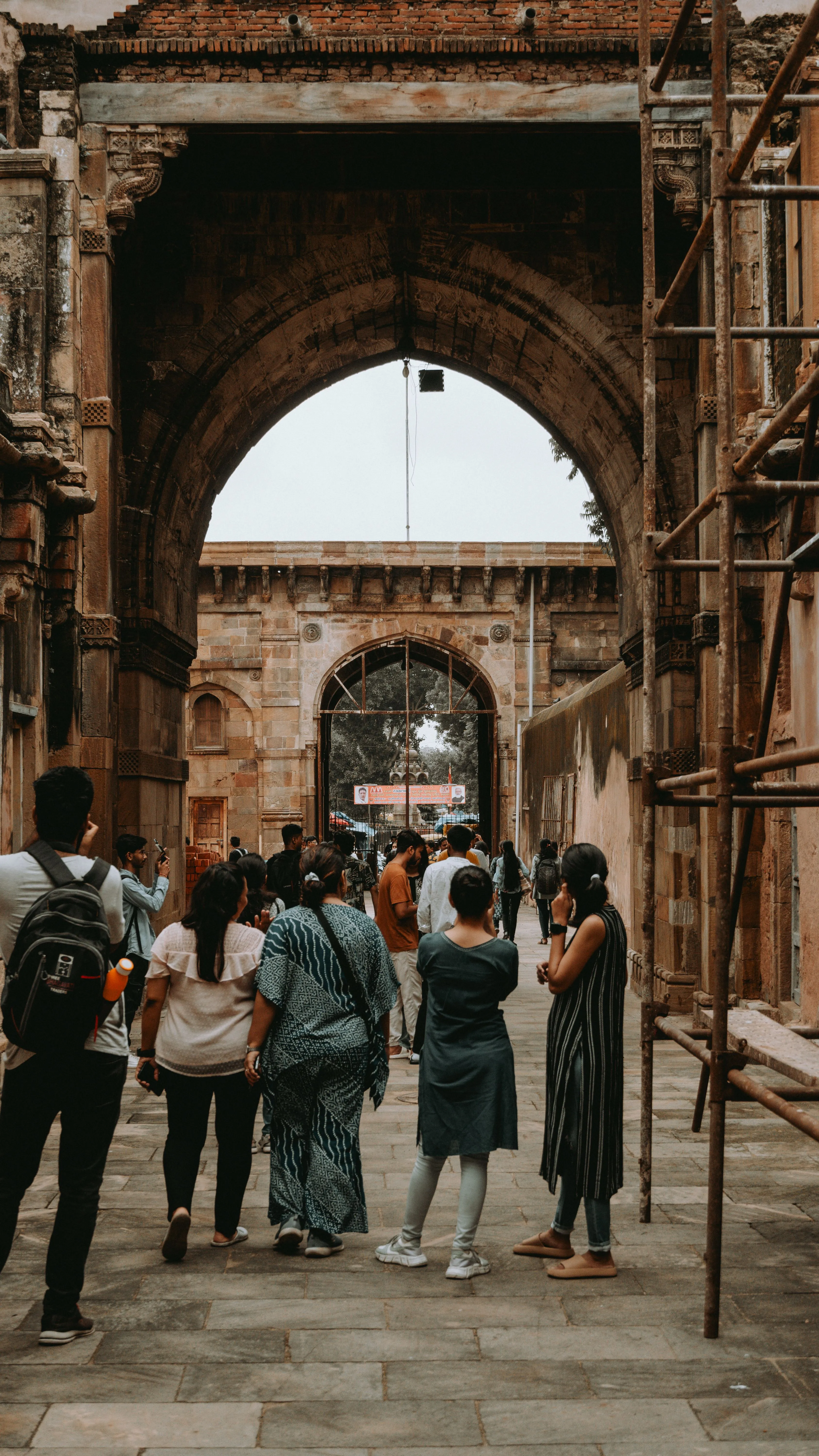 Travellers exploring a heritage site with a local guide
