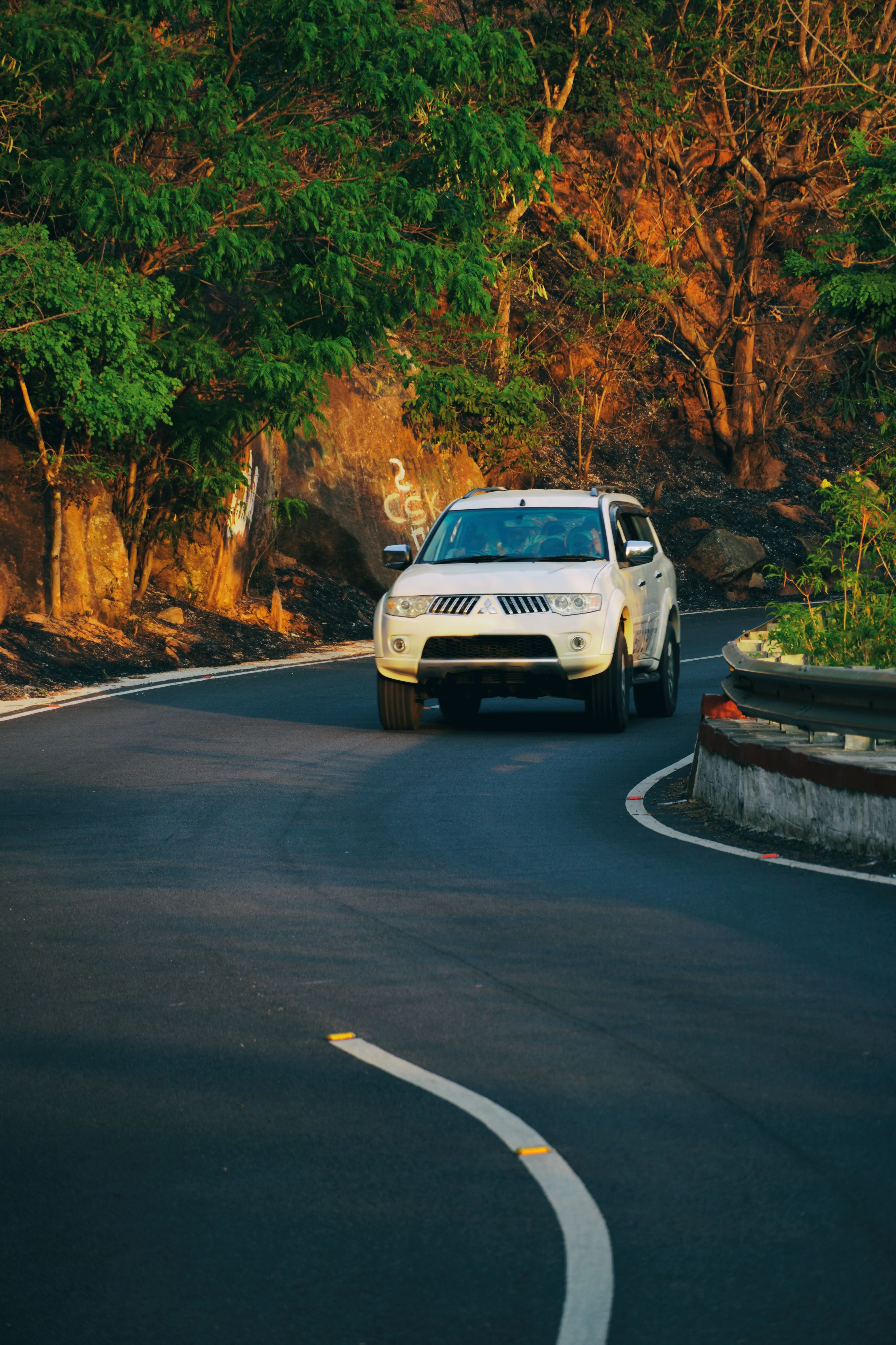 Comfortable SUV travelling on a scenic road